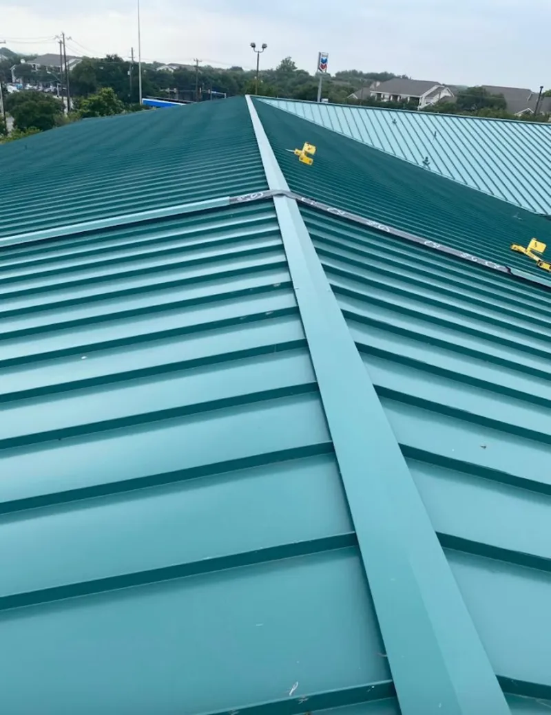 Green commercial metal roof ridge and valley for Metal Roof Repair in Arlington